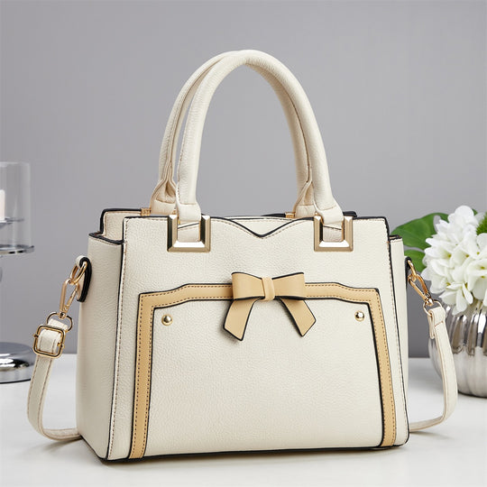 Damen elegante Handtasche mit schimmerndem Schleifendetail und abnehmbarem Schulterriemen Nord Taschen