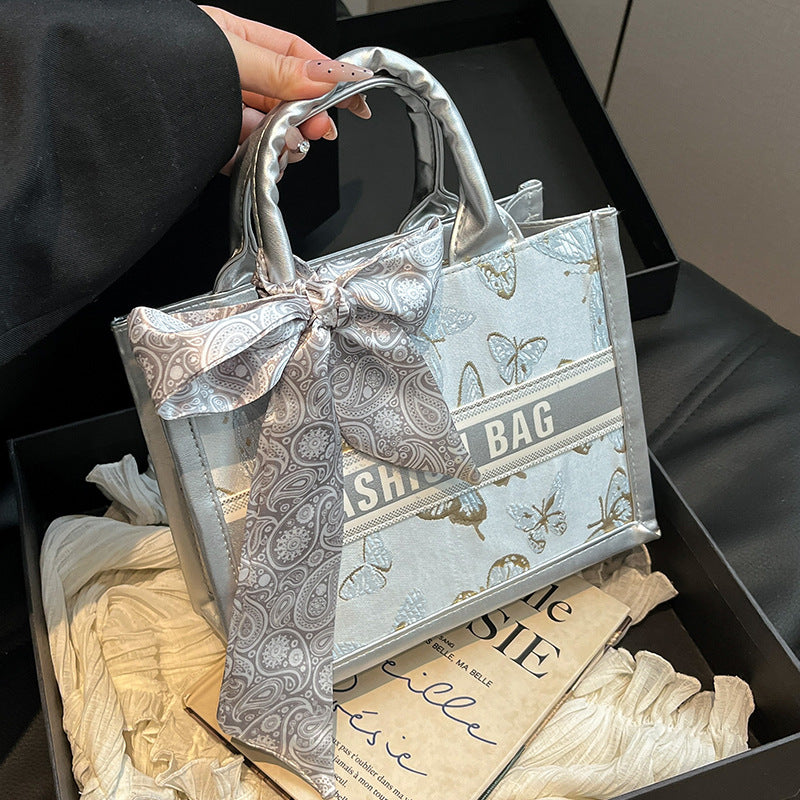 Damen Mini-Henkeltasche mit einzigartigem floralem Design und elegantem Schleifenakzent Nord Taschen