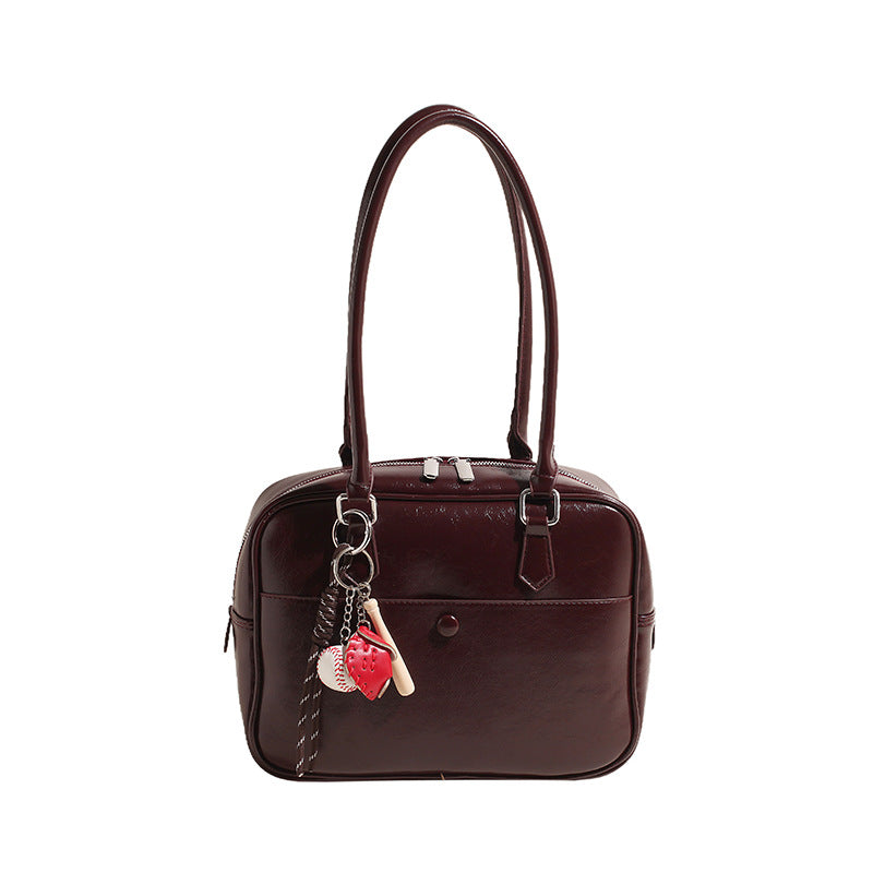 Damen praktische Lederhandtasche mit charmantem Anhänger Nord Taschen