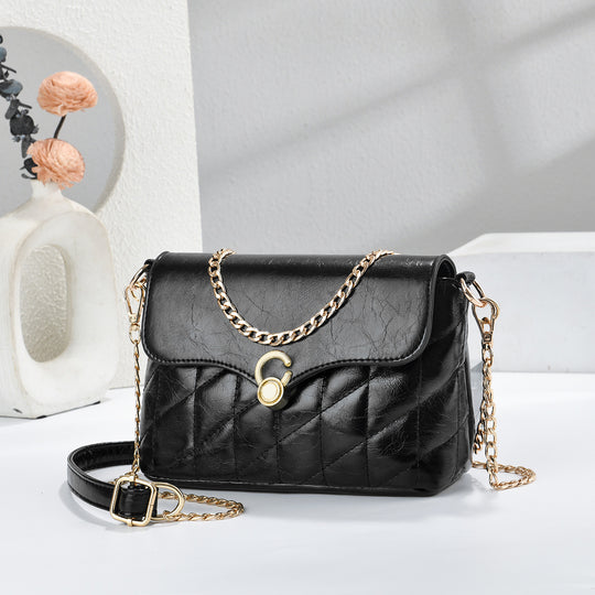 Damen Umhängetasche mit elegantem Steppdesign und goldenen Kettenakzenten Nord Taschen