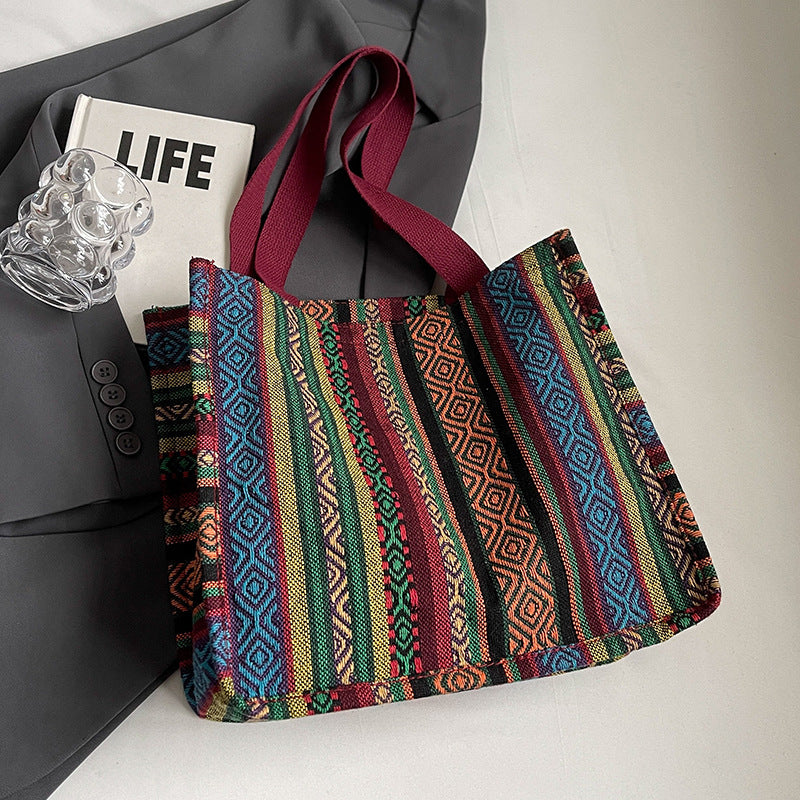 Damen Handtasche mit farbenfrohem geometrischen Muster Nord Taschen
