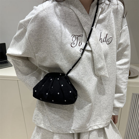 Damen stilvolle Wickeltasche mit floralem Design Nord Taschen