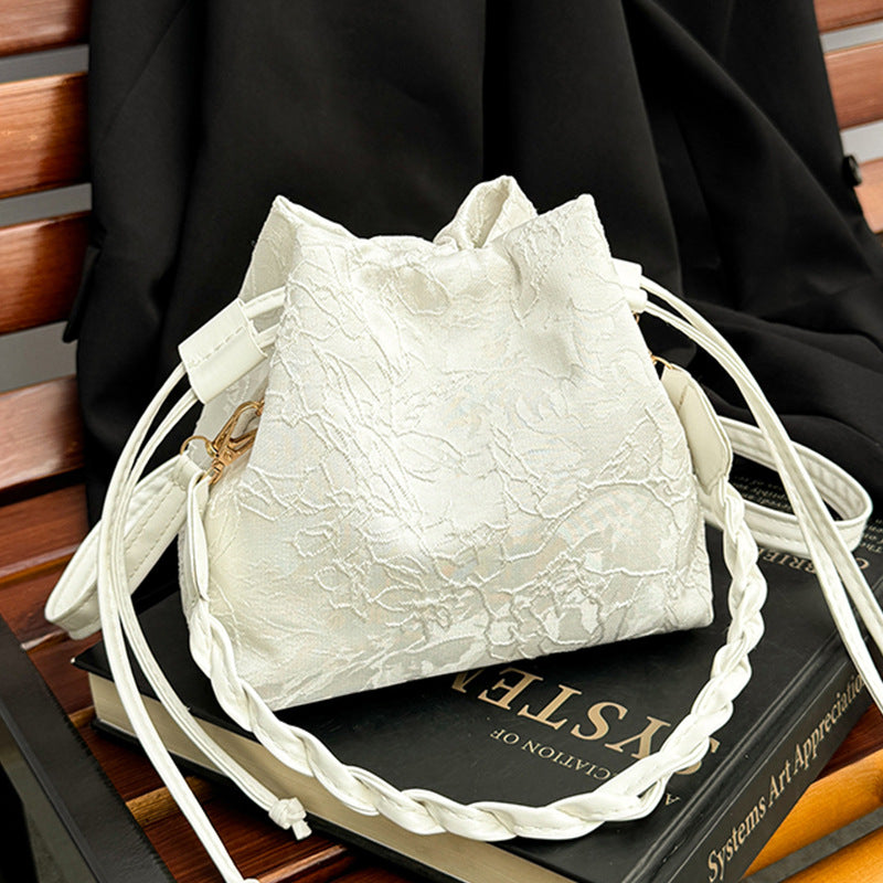 Damen Beuteltasche mit floraler Jacquardstruktur und flexiblem Tragegurt Nord Taschen