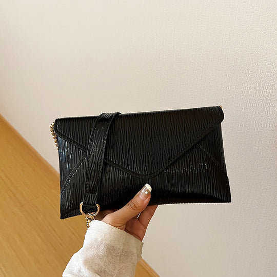 Damen Umhängetasche mit strukturiertem Design und verstellbarem Kettenriemen Nord Taschen