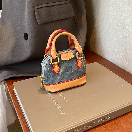 Damen Mini-Hobo-Tasche aus strukturiertem Kunstleder mit goldenen Akzenten Nord Taschen