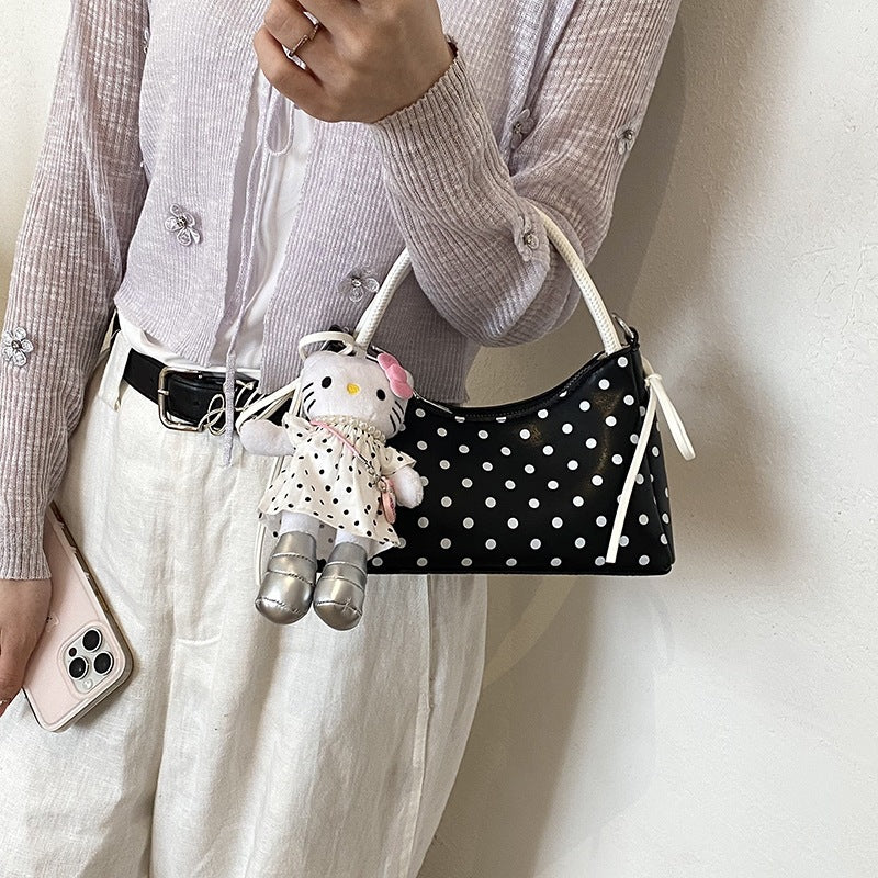 Damen Hobo-Tasche mit verspieltem Punktmuster und charmantem Anhänger Nord Taschen