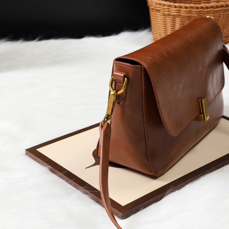 Damen Umhängetasche aus hochwertigem Kunstleder mit elegantem Klappenverschluss Nord Taschen