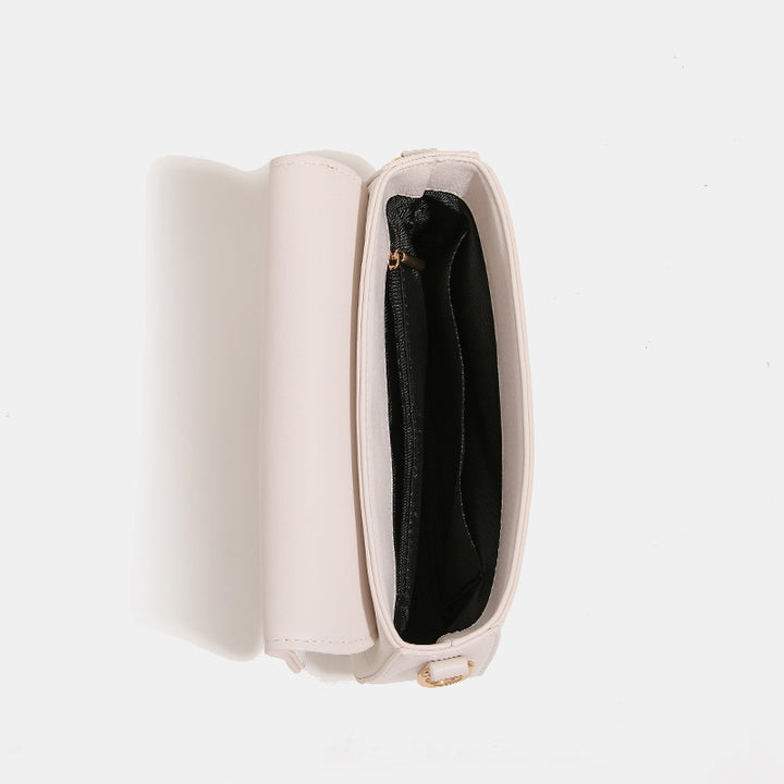 Damen Umhängetasche mit eleganter Steppung und fein gearbeiteten Metallakzenten Nord Taschen