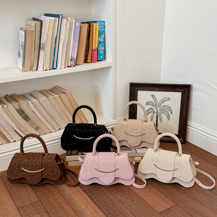 Damen strukturierte Handtasche mit eleganter Klappöffnung Nord Taschen