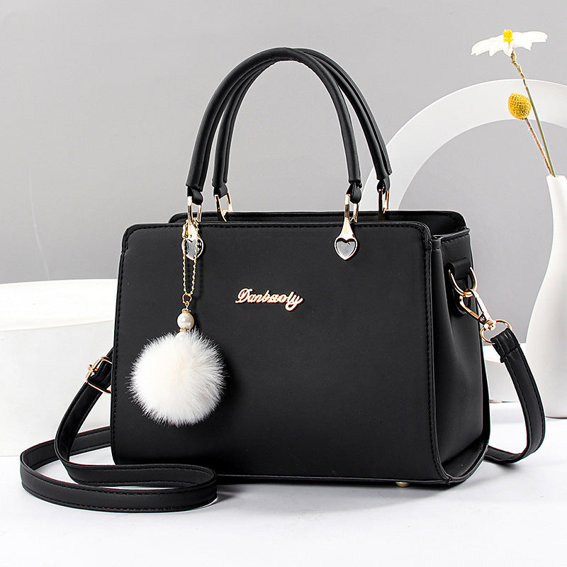 Damen hochwertige Handtasche mit abnehmbarer Quaste Nord Taschen