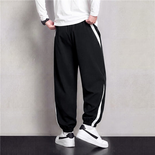 Herren Athleisure Jogginghose im Baggy‑Schnitt mit elastischem Bund, Tunnelzug und seitlichen Kontrastkeilen Nord Taschen