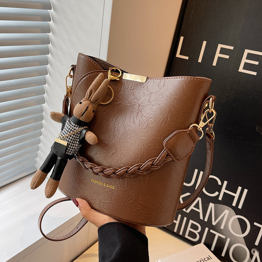 Damen Schultertasche aus hochwertigem Kunstleder mit geflochtenem Detail Nord Taschen