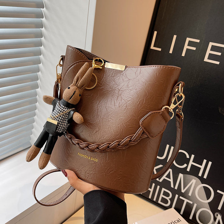 Damen Schultertasche aus hochwertigem Kunstleder mit geflochtenem Detail Nord Taschen