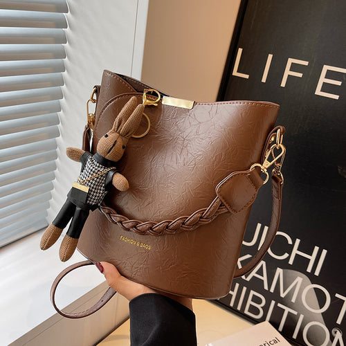 Damen Schultertasche aus hochwertigem Kunstleder mit geflochtenem Detail Nord Taschen