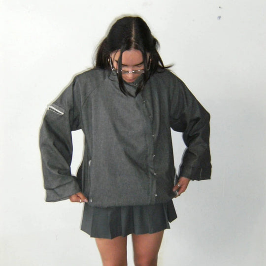 Damen Oversize-Boxy-Jacke mit asymmetrischem Druckknopfverschluss und Ärmeltasche Nord Taschen