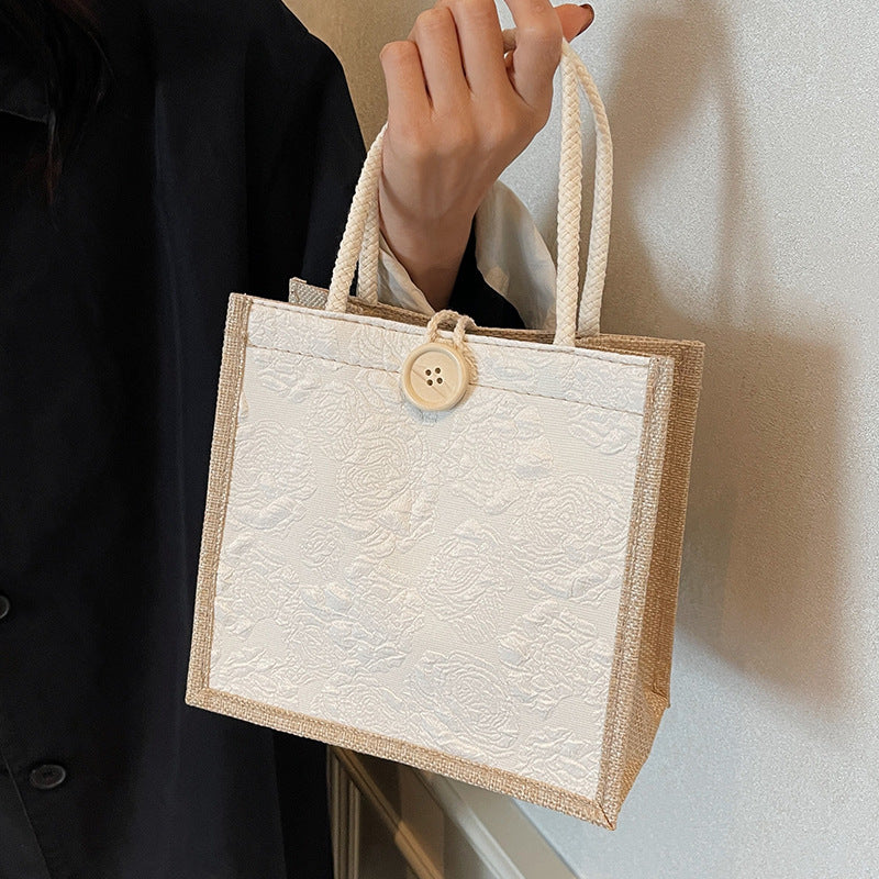 Damen Jute-Tasche mit elegantem Blütenmuster und praktischem Knopfverschluss Nord Taschen
