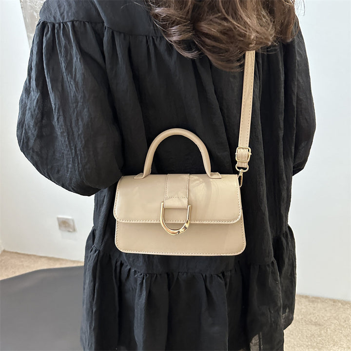 Damen elegante Umhängetasche mit strukturierter Oberfläche und goldenen Akzenten Nord Taschen