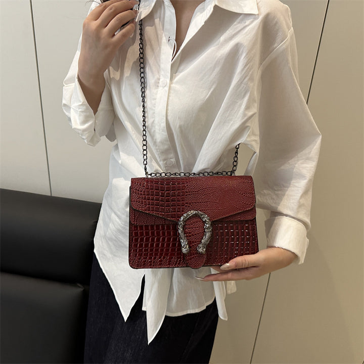 Damen elegante Handtasche mit stilvollem Schlangenverschluss Nord Taschen