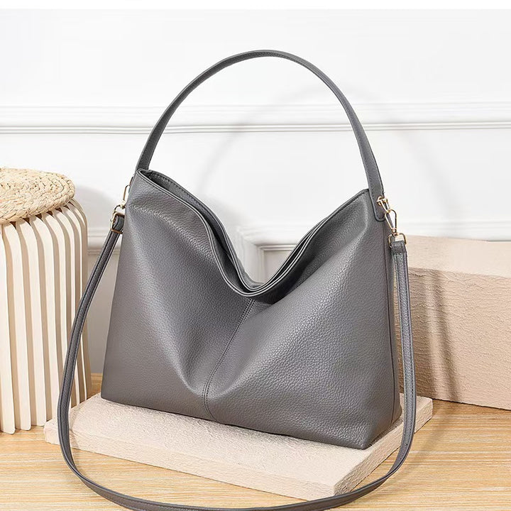 Damen praktische Umhängetasche mit geschwungenem Design Nord Taschen