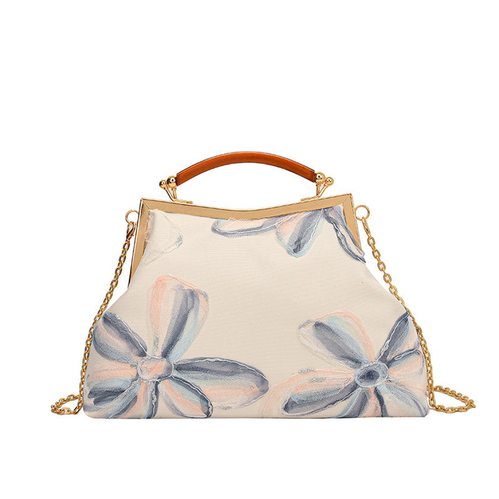 Damen Handtasche mit floralem Muster und elegantem Kettenakkzent Nord Taschen