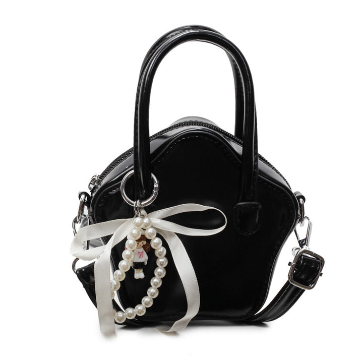 Damen modische Handtasche mit verspieltem Anhänger Nord Taschen
