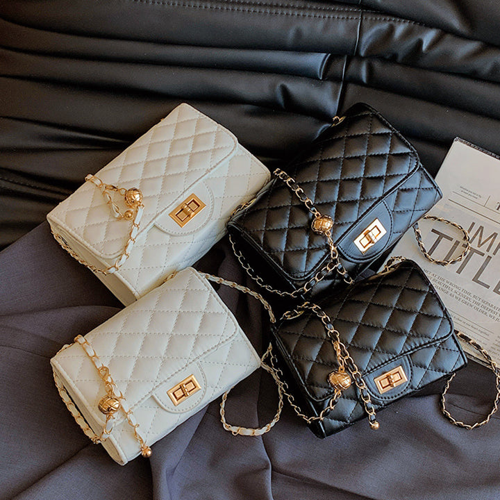 Damen Umhängetasche mit gefüttertem Quiltmuster und Goldakzenten Nord Taschen