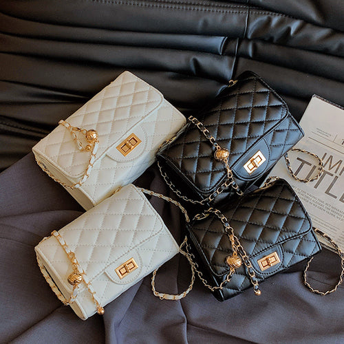 Damen Umhängetasche mit gefüttertem Quiltmuster und Goldakzenten Nord Taschen