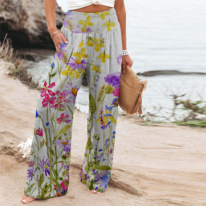 Damen weite Floral-Hose mit elastischem Bund und seitlichen Taschen
