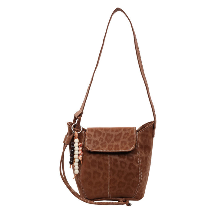 Damen Umhängetasche mit elegantem Leo-Muster und charmanten Details Nord Taschen