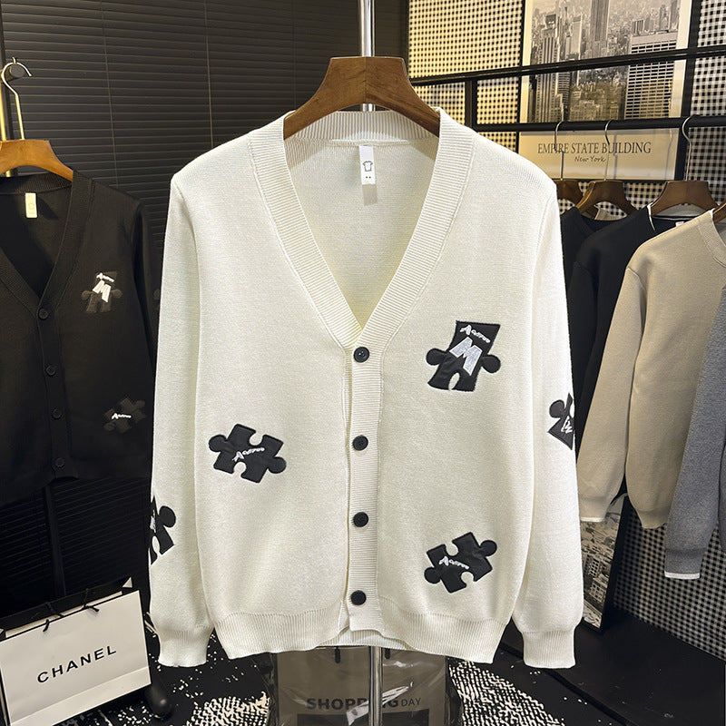 Herren Strick-Cardigan mit V‑Ausschnitt und dekorativen Puzzle‑Applikationen Nord Taschen