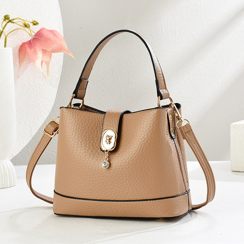 Damen elegante Handtasche mit goldenen Akzenten und abnehmbarem Schulterriemen Nord Taschen