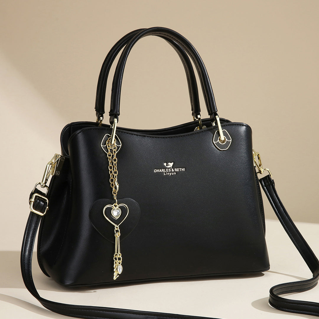 Damen elegante Handtasche mit Herzanhänger Nord Taschen