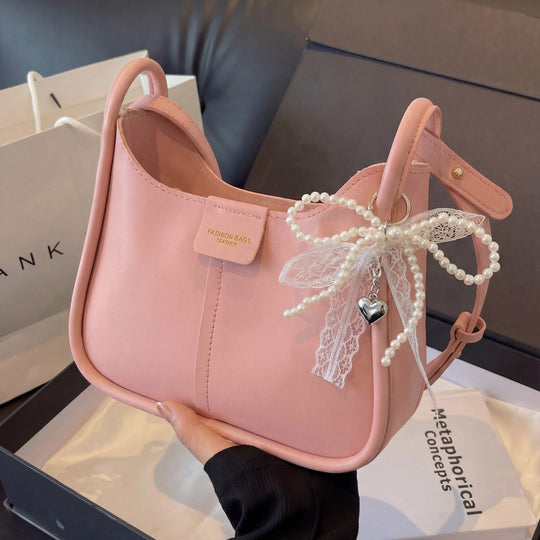 Damen Umhängetasche mit minimalistischer Form und verstellbarem Trageriemen Nord Taschen