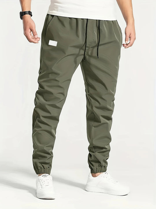 Herren Technische Jogginghose im Tapered‑Utility‑Stil mit elastischem Bund & Knöchelbündchen Nord Taschen