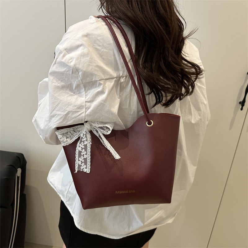 Damen Tote-Tasche aus hochwertigem Kunstleder mit verspieltem Schleifendetail Nord Taschen