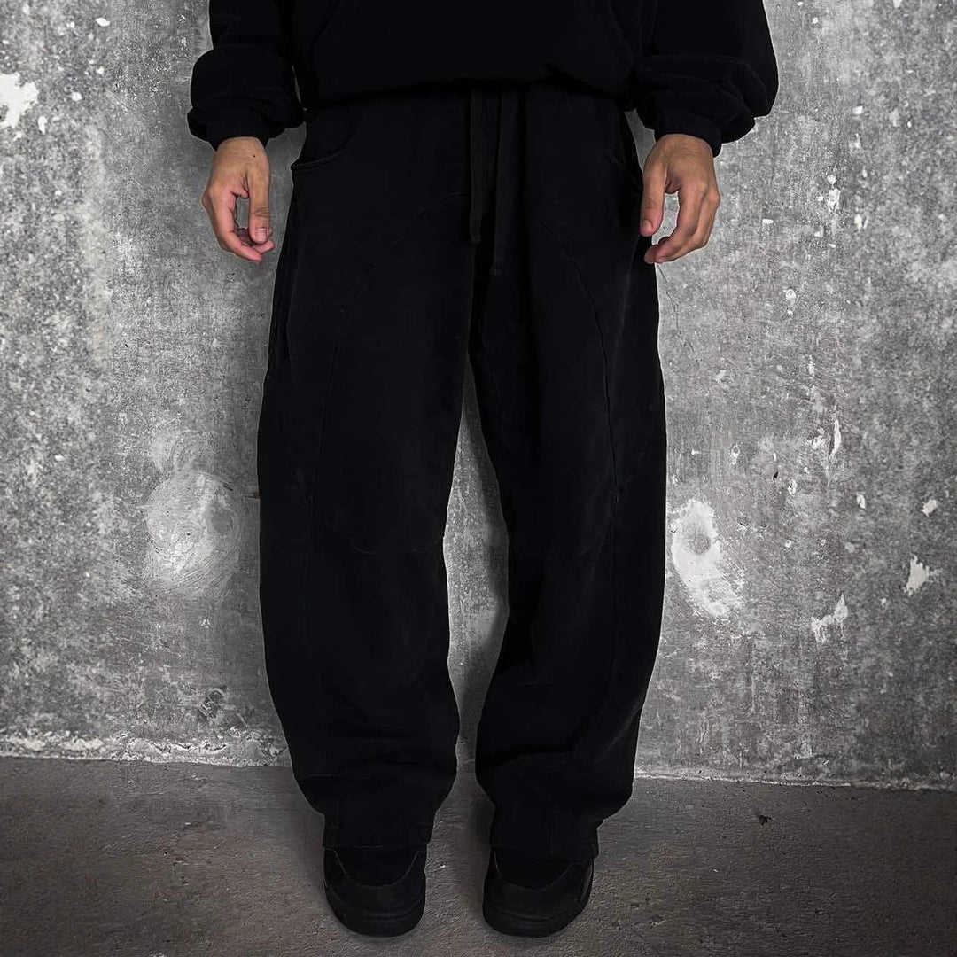 Herren nan Oversize-Freizeitjogger mit geschwungenen Nahtdetails, Kordelzugbund und elastischen Beinabschlüssen Nord Taschen