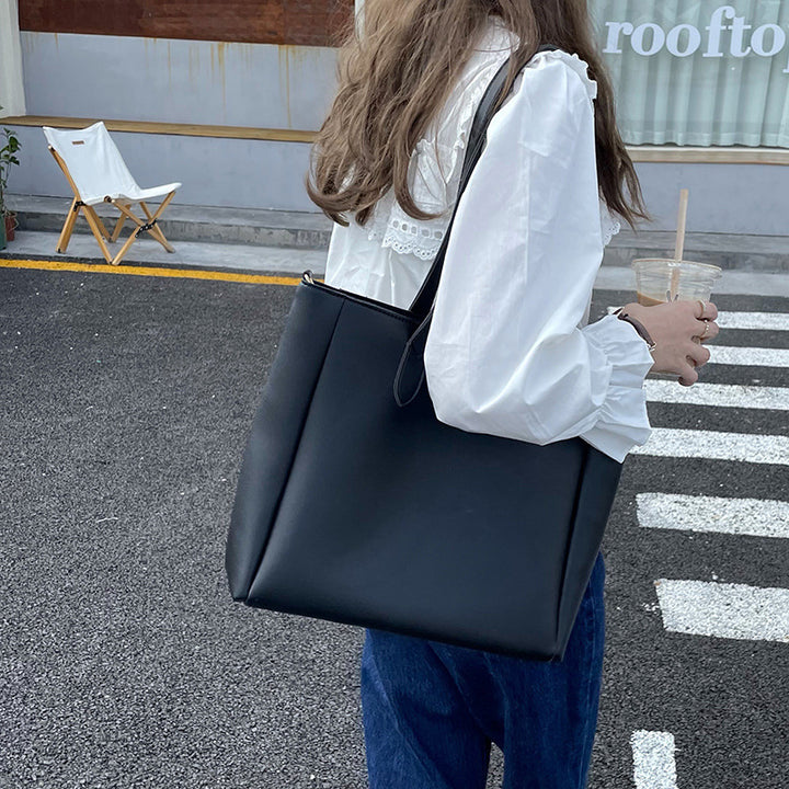 Damen elegante Tragetasche mit verspieltem Schnitt Nord Taschen