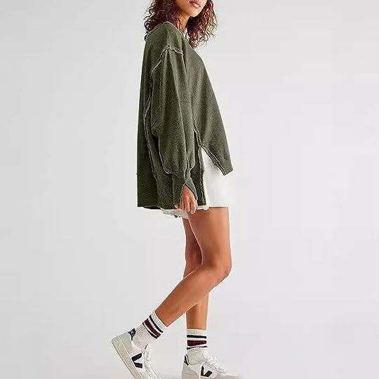 Damen Oversized Sweatshirt mit Ballonärmeln, seitlichen Schlitzen und offenen Kanten Nord Taschen
