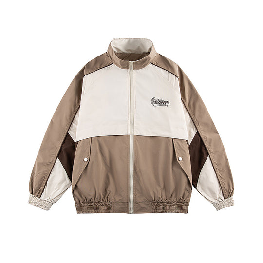 Unisex Kastig geschnittene Trackjacke im Retro-Sportstil mit hohem Stehkragen, Farbblock‑Einsätzen und elastischem Saum Nord Taschen
