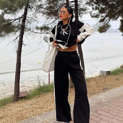 Damen athletisches Zweiteiler-Set aus strukturiertem Sweatstoff mit gekürzter Reißverschlussjacke und hochgeschnittener Jogginghose mit weitem Beinverlauf Nord Taschen