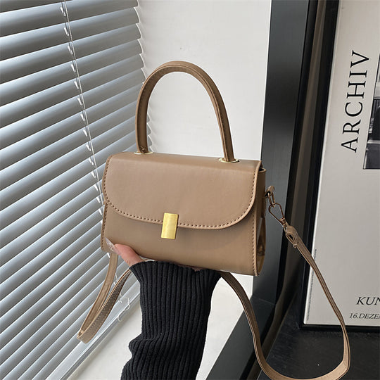 Damen-Handtasche mit abnehmbarem Schulterriemen und eleganter Verschlussmechanik Nord Taschen