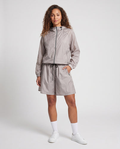 Damen Ultraleichte Kapuzen‑Regenjacke mit Kordelzug und Raglanärmeln Nord Taschen
