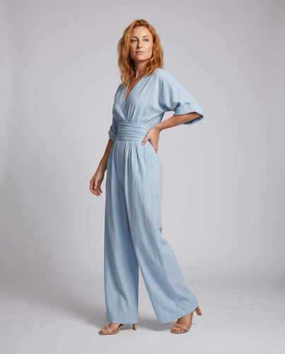 Damen Weit geschnittener Jumpsuit mit tiefem V-Ausschnitt und schickem Taillengürtel - Arvani