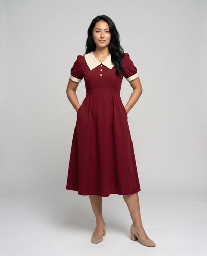 Damen Kleid mit klassischem Kragen und eleganten Knopfdetails