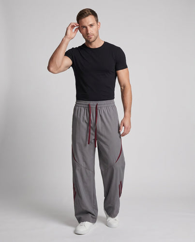 Herren Extra Breite Nylon Jogginghosen im Baggy-Schnitt mit Kordelzug, dekorativen Paneelen und seitlichen Kontraststreifen Nord Taschen