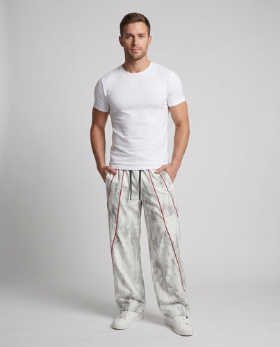 Unisex Weite Trackhose im Marmor-Look mit Tunnelzugbund & verstellbarem Saum