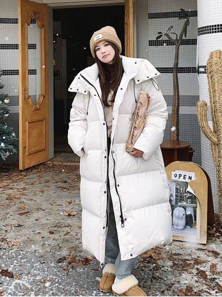 Nord Taschen | Lange Pufferjacke mit Kapuze für Damen - Winter