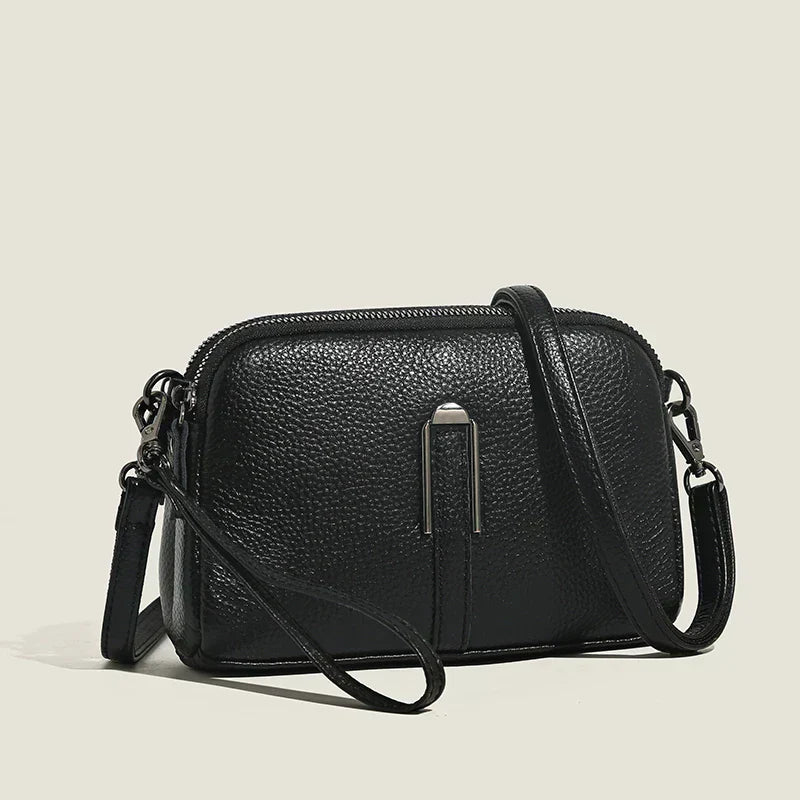 Nord Taschen | Kleine Leder-Umhängetasche mit Handgelenkriemen