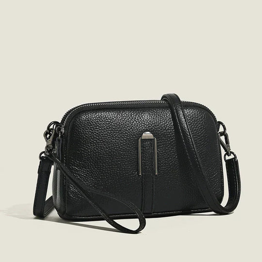 Nord Taschen | Kleine Leder-Umhängetasche mit Handgelenkriemen