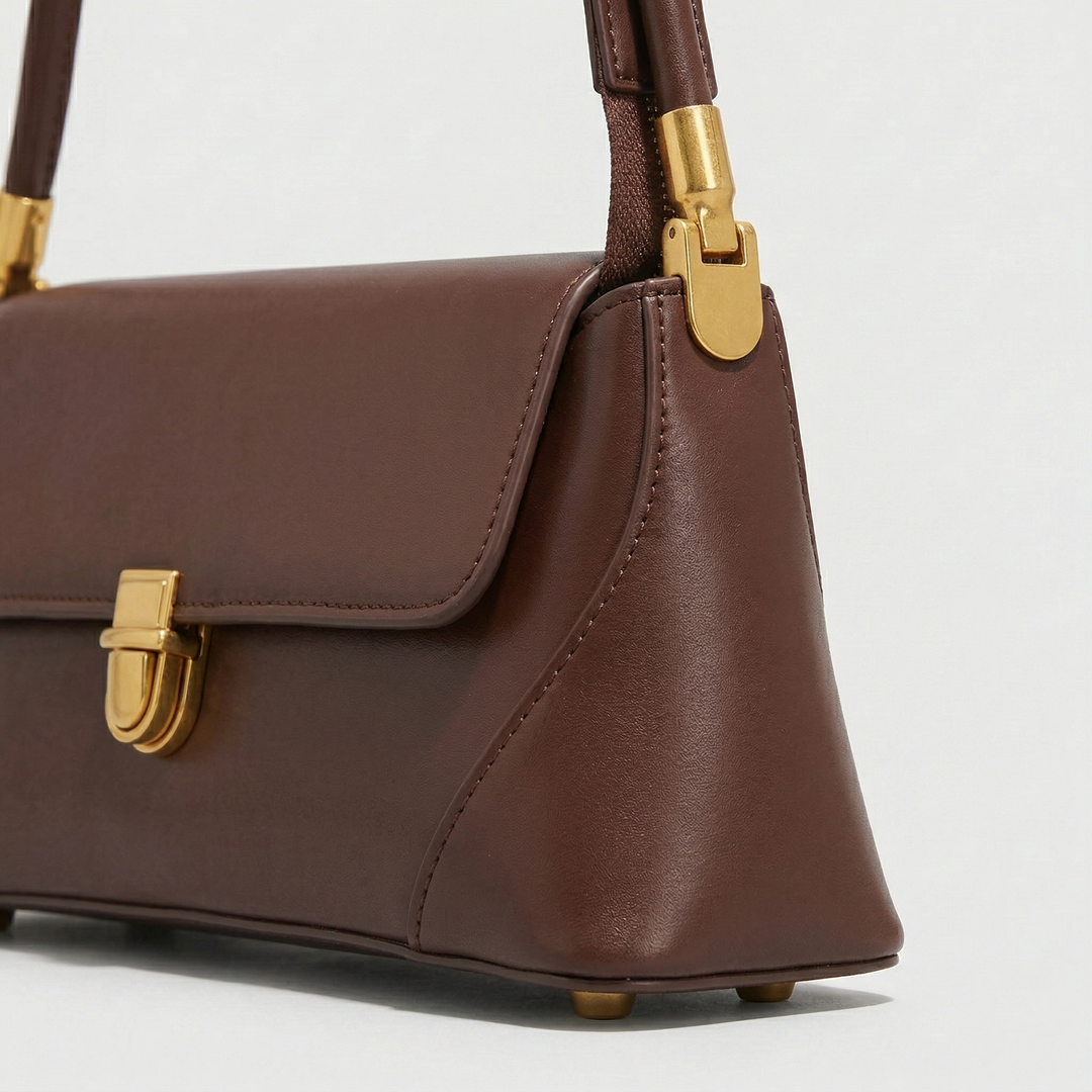 Nord Taschen | Strukturierte vegane Rindsleder-Schultertasche, goldener Verschluss